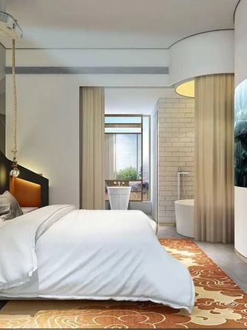 Großes Zimmer mit modernem Bad und innovativem Interior-Design.