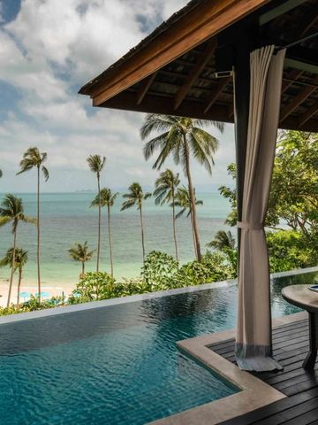 Infinity-Pool mit Blick auf das Meer und Palmen im Four Seasons Resort Koh Samui.