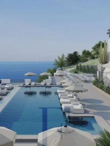 Infinity Pool und Terrasse mit Meerblick und Liegen