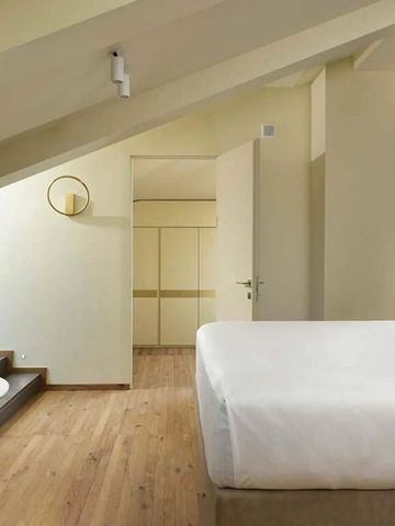 Elegante Dachgeschoss-Suite mit modernen Annehmlichkeiten