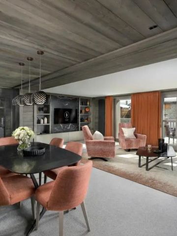 Luxuriöse Suite mit Essbereich und großer Fensterfront