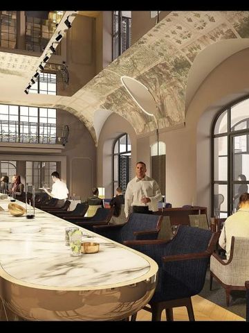 Geräumiger Lounge-Bereich mit Marmortheke und gemütlichen Sitzgelegenheiten