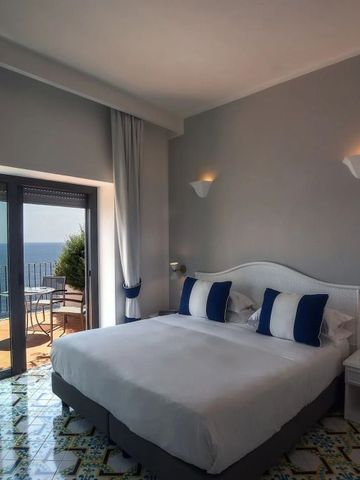 Doppelzimmer mit Balkon und Meerblick