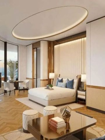 Großzügige Suite mit eleganter Einrichtung und Blick auf das Meer.