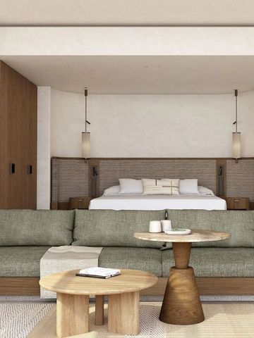 Großes Schlafzimmer mit angrenzendem Wohnbereich und stilvollem Dekor