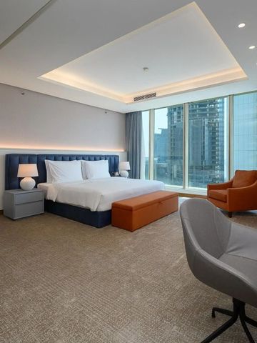 Luxuriöses Schlafzimmer mit moderner Einrichtung im Kempinski Doha.