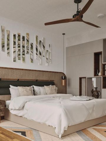 Stilvoll eingerichtetes Zimmer mit Doppelbett und modernen Designelementen