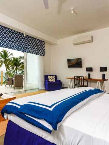 Hotelzimmer im KK Beach mit Meerblick und stilvoller Einrichtung