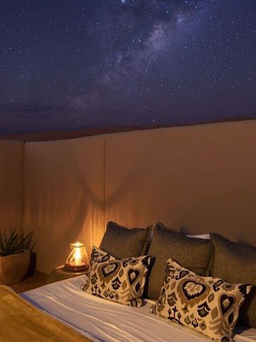 Gemütlicher Schlafbereich mit sternenklarem Himmel