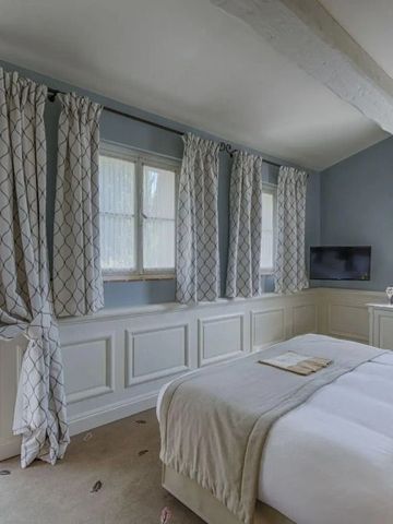 Geräumiges Hotelzimmer mit Zugang zur Terrasse