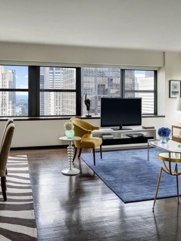 Luxuriöse Suite mit Wohnbereich und Stadtblick im Lotte New York Palace