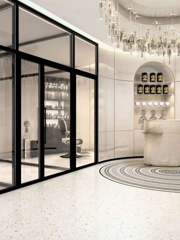 Chic gestalteter Friseursalon im Hotel mit stylischem Interieur und luxuriösen Details