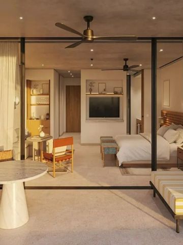 Blick von der Suite auf die Terrasse mit Sitzecke und Pool