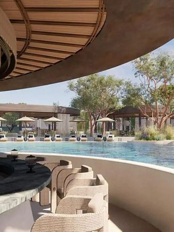 Bar am Pool mit geschwungener Theke und Sonnenliegen