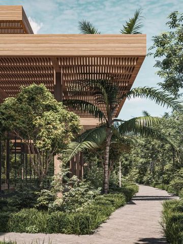 Flacher, modern gestalteter Außenbereich des Hotels mit Palmen und üppiger Vegetation.