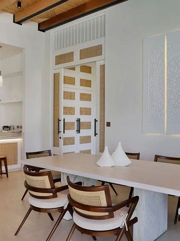 Eleganter Essbereich mit moderner Ausstattung und stilvollem Design.