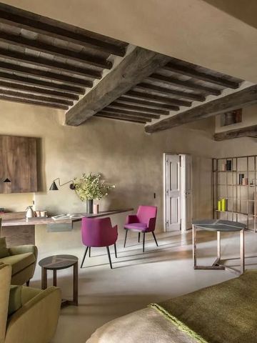 Geräumige Suite mit Sitzbereich und moderner Einrichtung