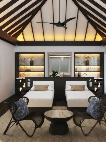 Zweibettzimmer mit stilvollem Interieur und Holzbalkendecke