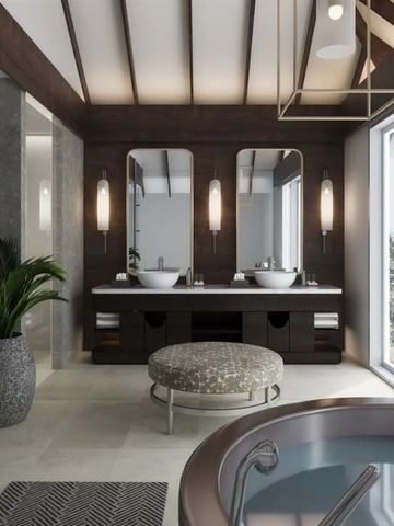 Luxuriöses Badezimmer mit Doppelwaschbecken und moderner Einrichtung