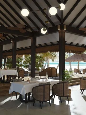 Restaurant mit elegant gedeckten Tischen und Blick auf den Strand