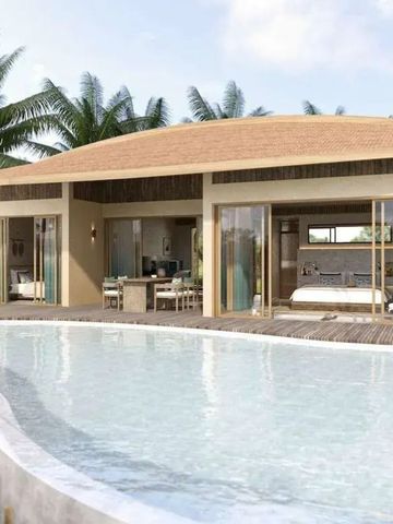 Luxuriöse Villa mit großem Pool umgeben von Palmen im Resort