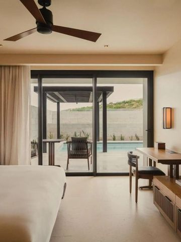 Modernes Schlafzimmer mit Blick auf privaten Pool