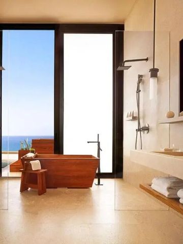 Luxuriöses Badezimmer mit Holzwanne und Meerblick im Nobu Hotel Los Cabos