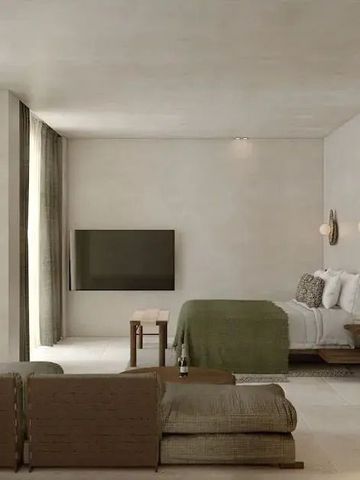 Weiträumiges Zimmer mit Wohnbereich und moderner Sitzecke im Oku Bodrum Hotel