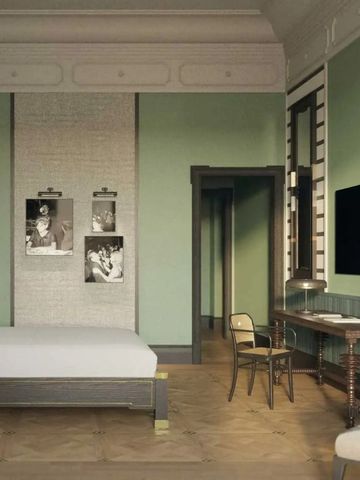 Luxuriös eingerichtetes Hotelzimmer mit grünen Wänden und stilvollen Möbeln