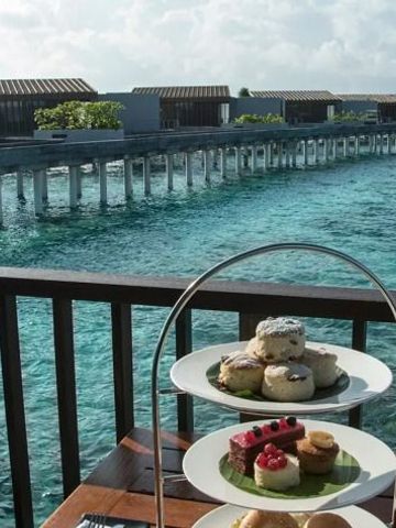 Meeresblick von der Terrasse mit Nachmittagstee im Park Hyatt Maldives Hadahaa