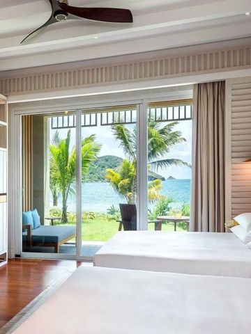 Zweibettzimmer mit Meerblick und Palmen im Park Hyatt St. Kitts