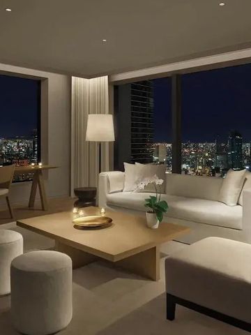 Luxuriöses Wohnzimmer in Suite mit Blick auf die nächtliche Skyline von Tokio