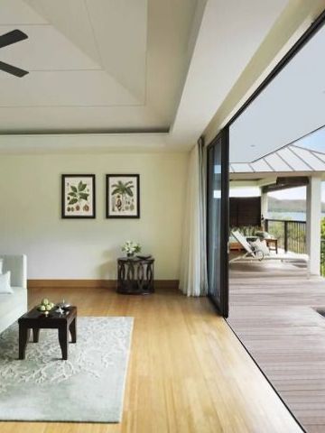 Offenes Zimmer mit Terrasse und Naturblick im Raffles Seychelles