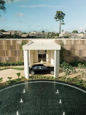 Außenansicht des Raffles Sentosa mit Brunnen und Luxuslimousine