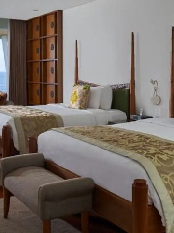 Zimmer mit zwei Betten und atemberaubendem Meerblick