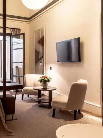 Geräumige Suite mit Sitzbereich und Flachbildfernseher