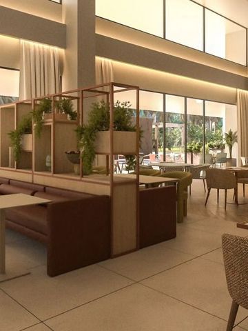 Restaurant mit modernen Sitzgelegenheiten und großer Fensterfront