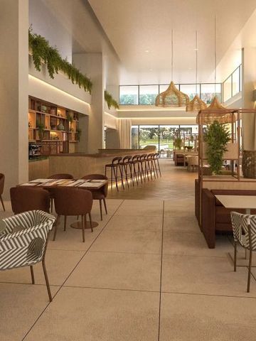 Geräumiges Restaurant mit modernen Möbeln und Pflanzenakzenten