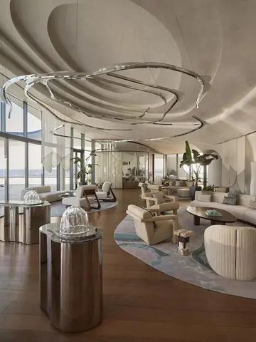 Luxuriöse Lounge mit geschwungenem Decken- und Möbeldesign