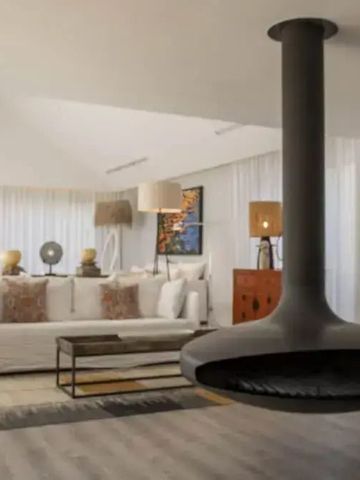 Geräumiger Wohnbereich mit modernem Kamin und stilvoller Einrichtung