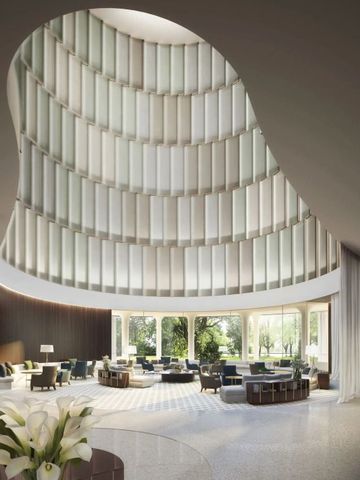 Große Lobby mit beeindruckendem Deckendesign und Sitzgelegenheiten