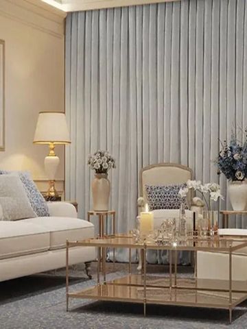 Harmonisch eingerichteter Wohnbereich mit Sofas und eleganten Dekorationen