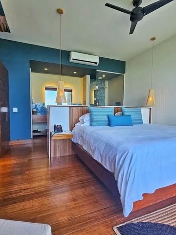 Modernes Zimmer im Los Altos Resort mit Holzdetails und klaren Linien