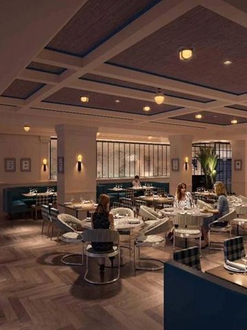 Elegante Restaurantatmosphäre mit gedämpfter Beleuchtung und stilvollen Möbeln