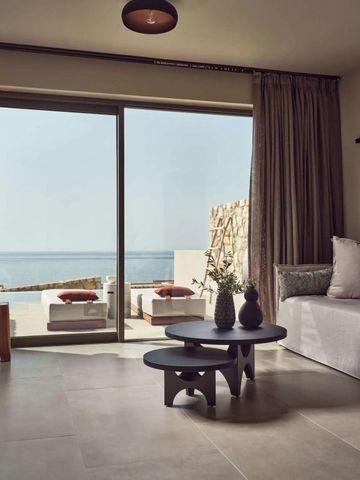 Chice Suite mit Sitzgelegenheit und direktem Zugang zur privaten Terrasse