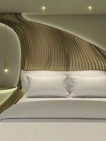 Modernes Zimmerdesign mit einzigartiger Wandgestaltung im Vila Foz Hotel