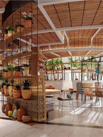 Helles Restaurant mit Pflanzen, modernen Möbeln und natürlichem Licht