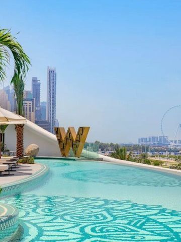 Infinity Pool mit Ausblick auf das Riesenrad und die Skyline von Dubai beim W Dubai Mina Seyahi