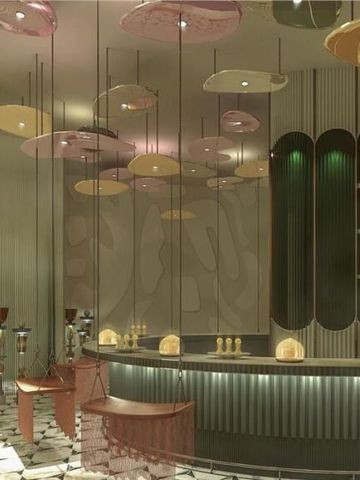 Elegante Bar mit stilvollen Lichtelementen im W Dubai Mina Seyahi