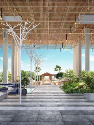 Moderner Empfangsbereich mit offenen Strukturen und grünen Pflanzen